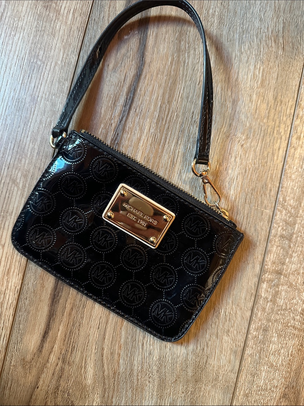 Michael Kors Black Patent Wristlet with Gold Plaque